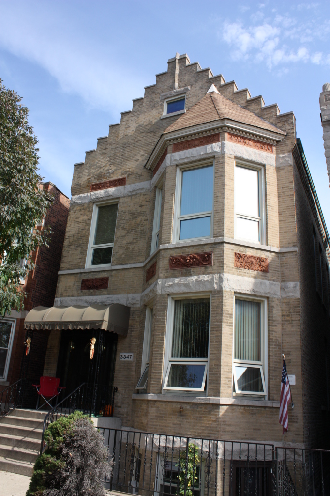 Stepped gable boomtown front on a two-flat on the 3300 block of South Union