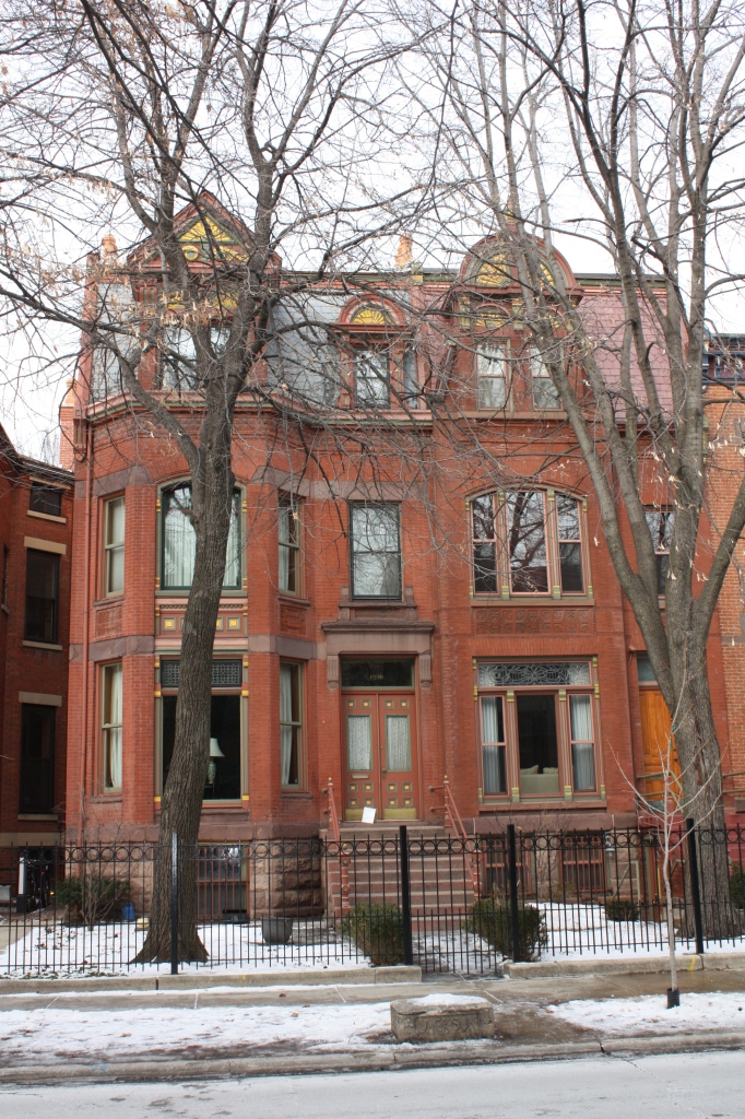 Andrew T. Merriman House at 1516 W Jackson and the George Ross House at 1514 W Jackson are attached but different complimentary homes built by John V. Osdel in 1884.