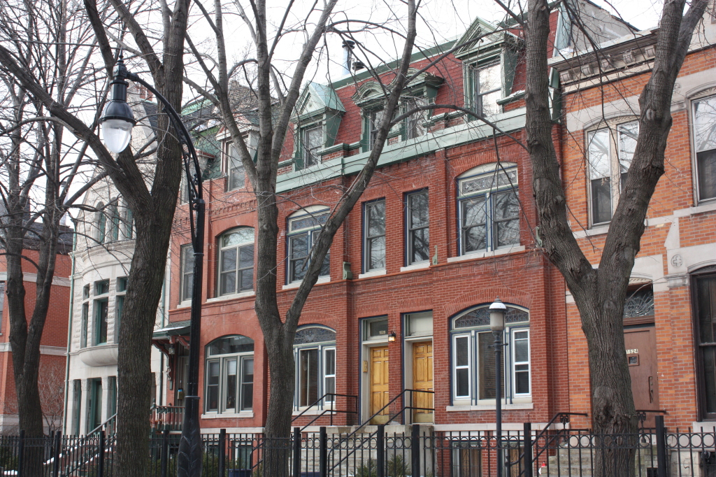 Mary J. Dodge House at 1526-1530 W Jackson, an 1885 Flat-front Queen Anne with mansard roof designed by William Strippelman and Co.